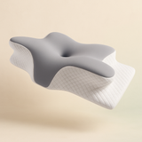 Oreiller ergonomique en mousse à mémoire de forme offrant un soutien optimal de la nuque pour soulager les douleurs cervicales et lombaires.